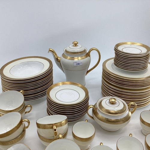 228 - A very good part set of Minton Buckingham Fine bone china including 12 tea cups, 11 coffee cups, bow... 