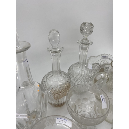 235 - Quantity of late C19th and C20th glassware, decanters jugs and bowls etc