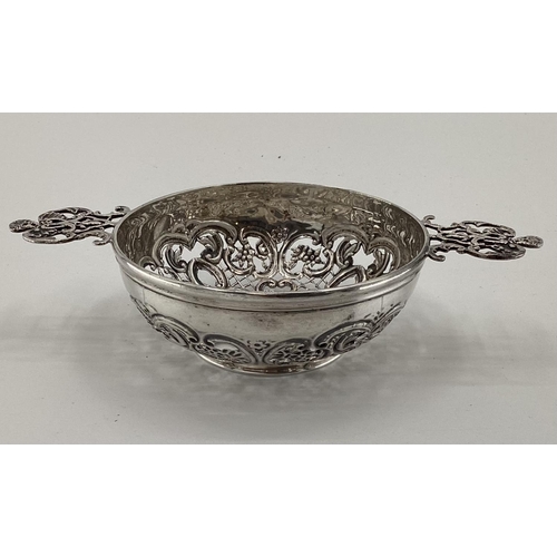 24 - Sterling silver two handled pierced bowl strainer, London 1899, 86g