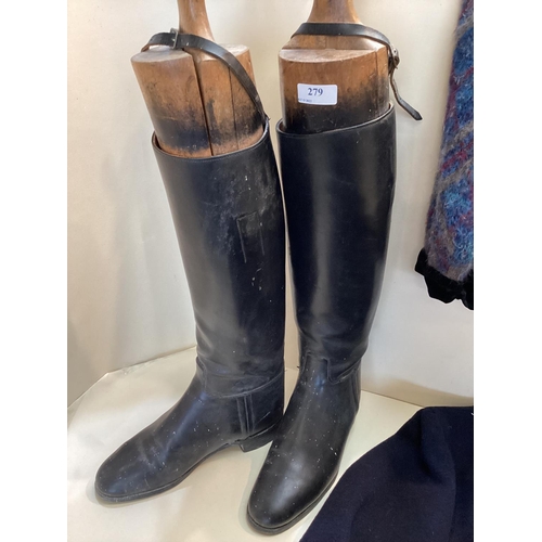 279 - Pair of black leather riding boots with trees, a ladies navy hunting coat by Golding of Newmarket, a... 