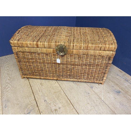 283 - Large leather suitcase and a worn basket ware trunk