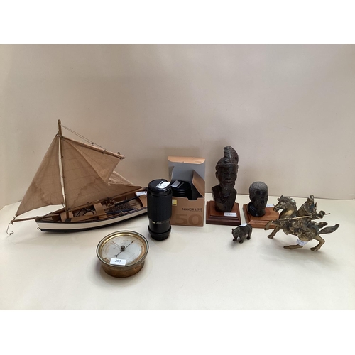 285 - Quantity of mixed collectables including small wooden boat,  bronze figure of a bear, two figures of... 