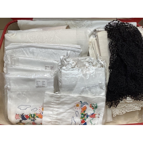 294 - Suitcase full of vintage linen, and a bed cover