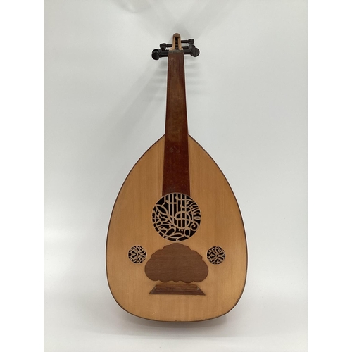 306 - An Oud, with label to interior with date and provenance, and maker ( Bagdad, machine made, see image... 