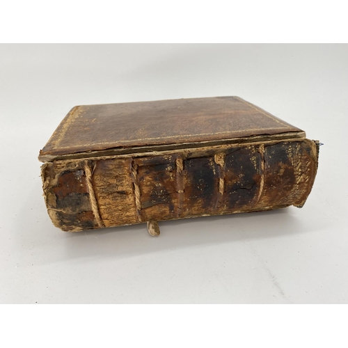 309 - large quantity of collectables including gilded book plates with Arabic calligraphy, a worn leather ... 