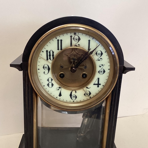 320 - A French, black slate domed top mantel clock, with circular brass dial , (crack to enamel face), 39c... 