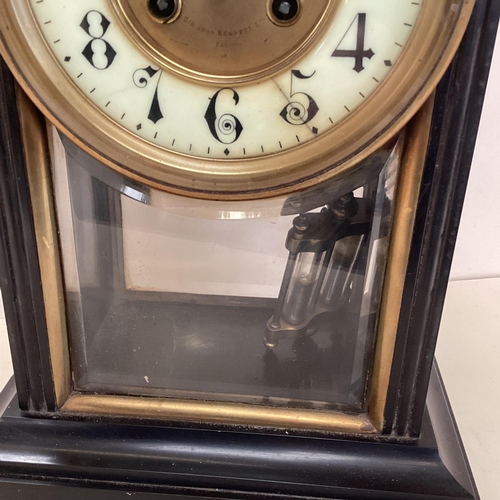 320 - A French, black slate domed top mantel clock, with circular brass dial , (crack to enamel face), 39c... 