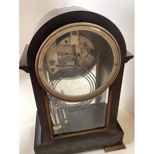 320 - A French, black slate domed top mantel clock, with circular brass dial , (crack to enamel face), 39c... 