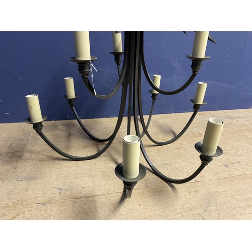 332 - Cast metal 9 branch ceiling chandelier with star pediment, 66cmW