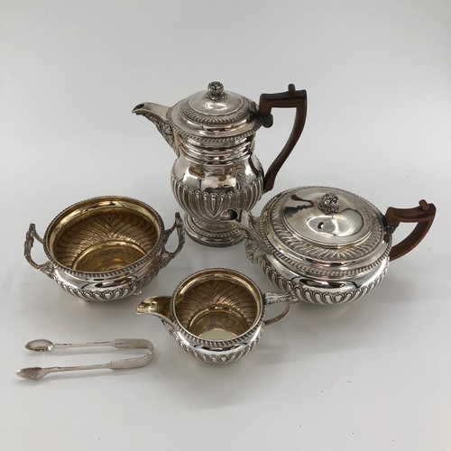 45 - A sterling silver four piece tea set with half reeded design by William Robertson 1816, London, appr... 