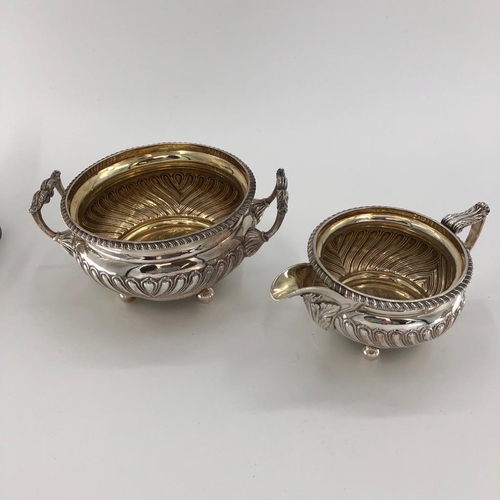 45 - A sterling silver four piece tea set with half reeded design by William Robertson 1816, London, appr... 