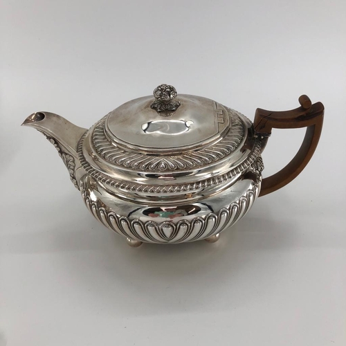 45 - A sterling silver four piece tea set with half reeded design by William Robertson 1816, London, appr... 