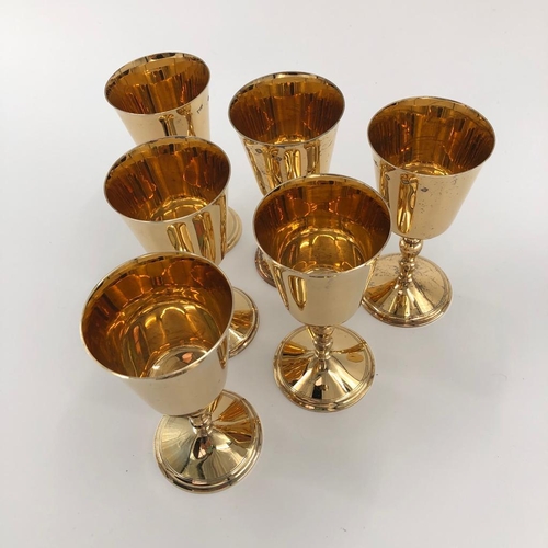 47 - A set of six sterling silver gilt wine goblets by Walker and Hall, Sheffield, 1975 each 15cmH, 1250g