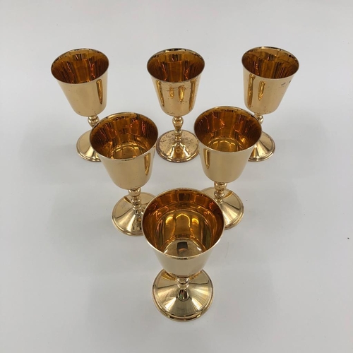 47 - A set of six sterling silver gilt wine goblets by Walker and Hall, Sheffield, 1975 each 15cmH, 1250g