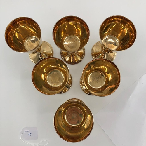 47 - A set of six sterling silver gilt wine goblets by Walker and Hall, Sheffield, 1975 each 15cmH, 1250g