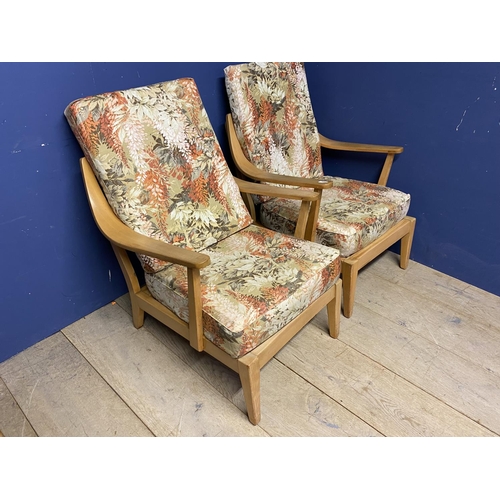 488 - Two Greaves and Thomas armchairs, and a modern square wooden coffee table, being sold on behalf of c... 