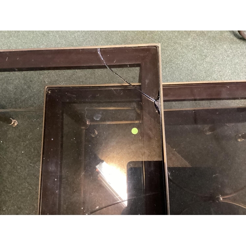 495 - Nest of 3 glass and yellow metal tables (glass damaged), and a side table