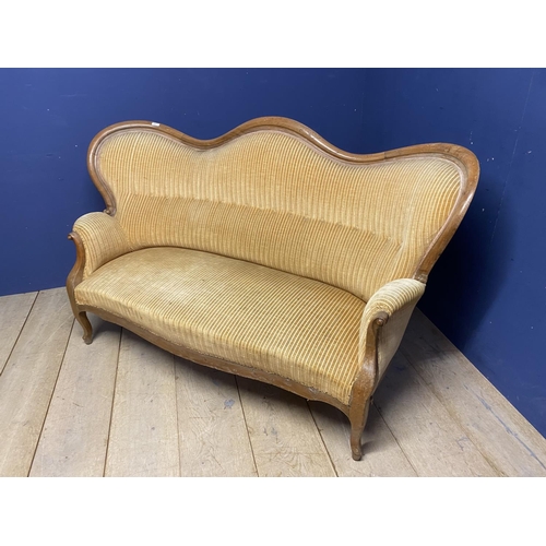 497 - French, C19th walnut framed sofa, with shaped back, and legs, and gold coloured upholstery. With muc... 