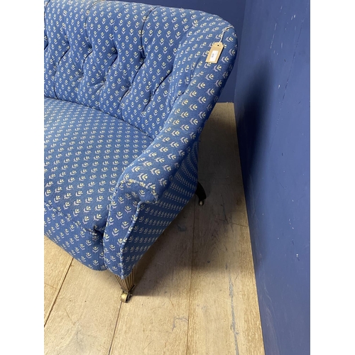 498 - Howard style sofa, with reeded mahogany legs and brass castors, blue upholstery in need of a clearn,... 