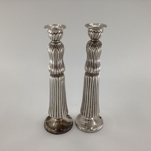 5 - Pair of sterling silver candlesticks with sectional reeded design, stamped Lalaounis, Greece, 925 wi... 