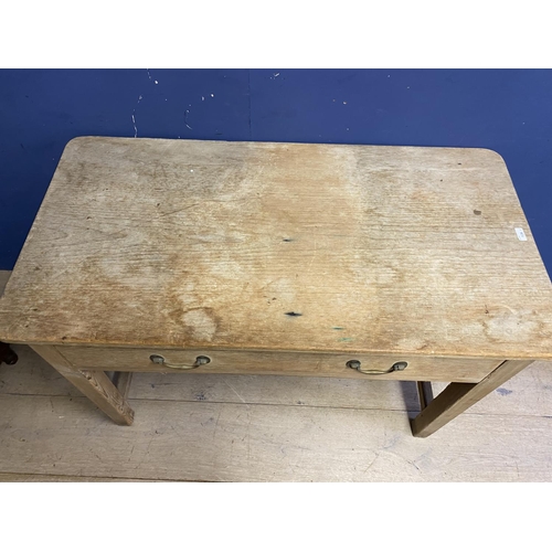 528 - A worn pine scrub top effect kitchen table with stretcher to base; and anther occasional table, with... 