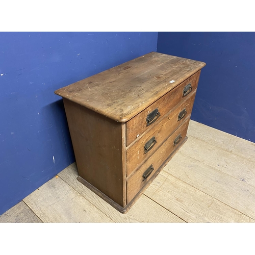 536 - A small pine chest of 3 long drawers