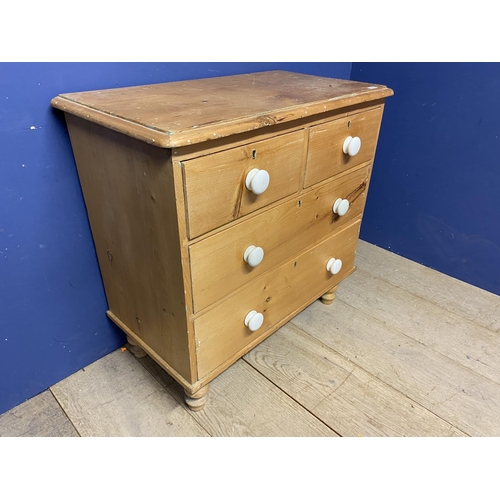 538 - a pine chest of 3 long drawers with white knob handles
83w x 44d x 82cm high