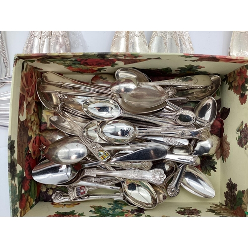 54 - A large collection of plated flatware and kitchen utensils