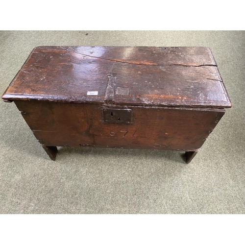 551 - A small part C17th oak coffer with rising lid, with 1671 date carved to front, 77cmW x 33cmD x 48cmH