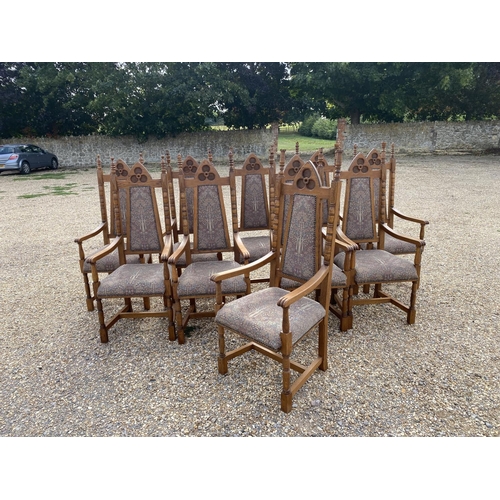 568 - Very good set of ten oak high back Arts and Crafts style dining chairs, upholstered back and seat in... 