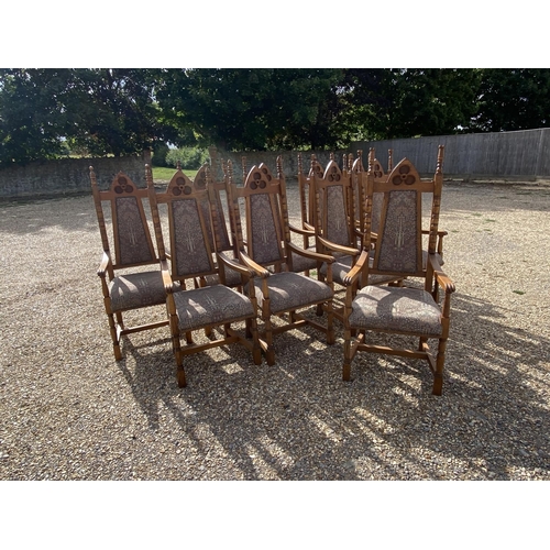 568 - Very good set of ten oak high back Arts and Crafts style dining chairs, upholstered back and seat in... 