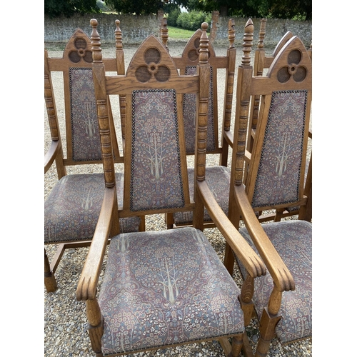 568 - Very good set of ten oak high back Arts and Crafts style dining chairs, upholstered back and seat in... 