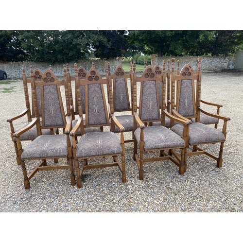 568 - Very good set of ten oak high back Arts and Crafts style dining chairs, upholstered back and seat in... 