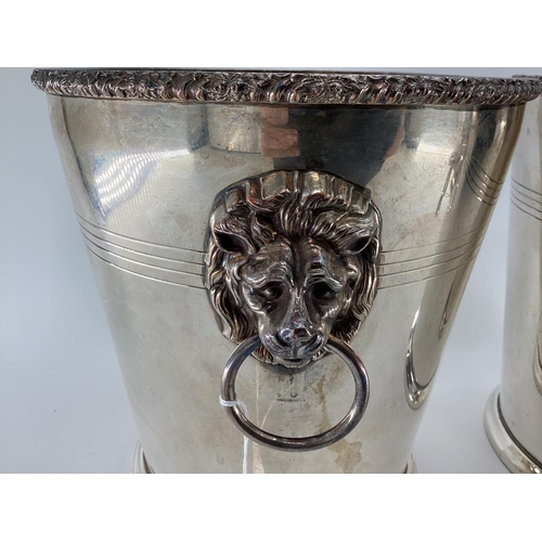 66 - A pair of silver plated wine/ice buckets with lion head and hoop handles by Mappin & Webb, 23cm H