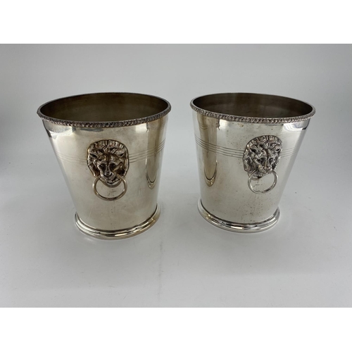 66 - A pair of silver plated wine/ice buckets with lion head and hoop handles by Mappin & Webb, 23cm H