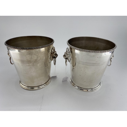 66 - A pair of silver plated wine/ice buckets with lion head and hoop handles by Mappin & Webb, 23cm H