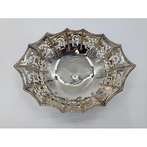 7 - Silver pierced bowl raised on 4 scrolling feet, marked silver, 220grams, 25cmL  x 19cmW x 7cmH