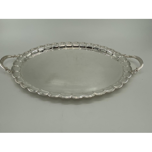 78 - A collection of silver plated oval trays to include a pierced gallery example (5)