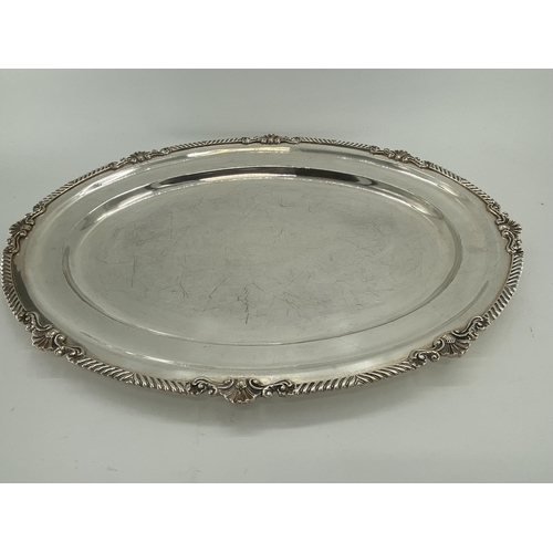 78 - A collection of silver plated oval trays to include a pierced gallery example (5)