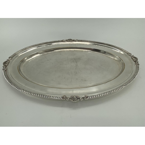 78 - A collection of silver plated oval trays to include a pierced gallery example (5)