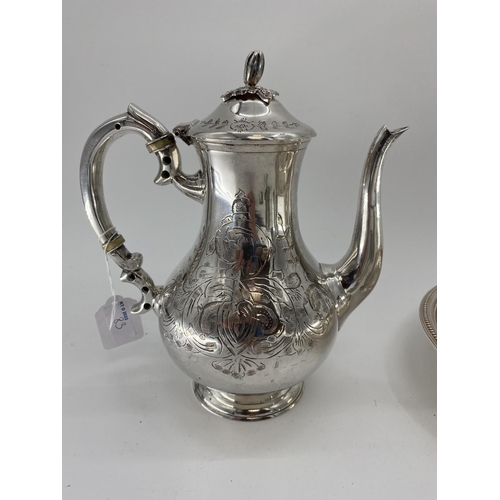 83 - A collection of silver plated and pewter items to include a thermos water jug and oval bowl and a ta... 