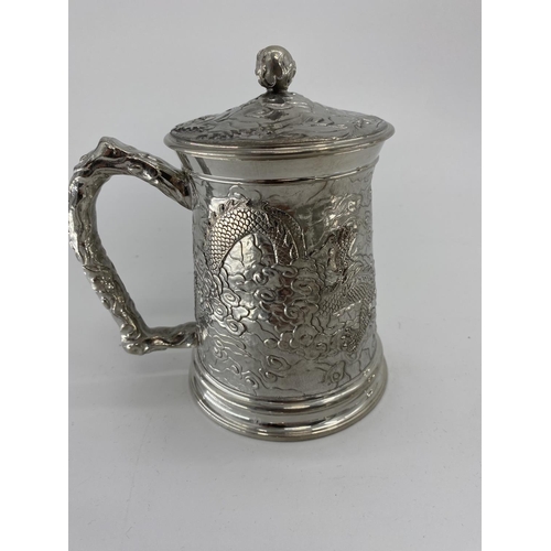 83 - A collection of silver plated and pewter items to include a thermos water jug and oval bowl and a ta... 