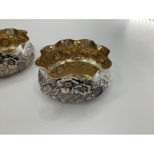 9 - Four Turkish silver rose bowls, with flared rims and applied decoration, gilt interiors, stamped Mel... 