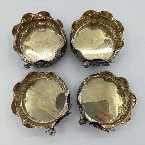 9 - Four Turkish silver rose bowls, with flared rims and applied decoration, gilt interiors, stamped Mel... 