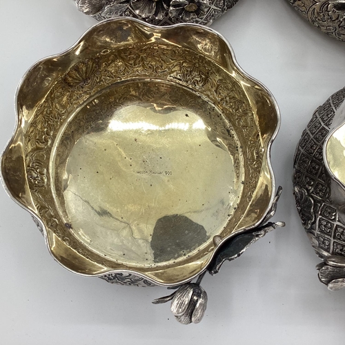 9 - Four Turkish silver rose bowls, with flared rims and applied decoration, gilt interiors, stamped Mel... 