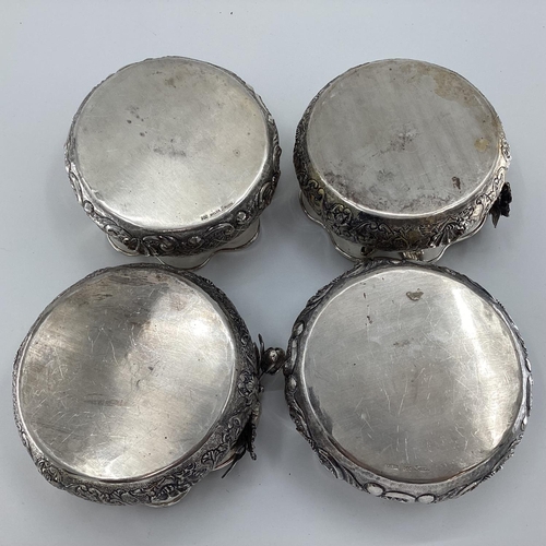 9 - Four Turkish silver rose bowls, with flared rims and applied decoration, gilt interiors, stamped Mel... 