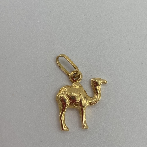 92 - Egyptian yellow metal pendant in the form of a camel, 1.8grams