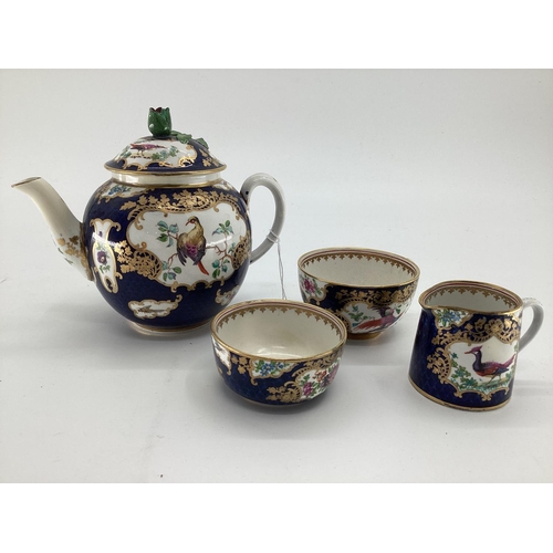 338 - A C19th Derby style part tea set , blue ground with gilt decoration with hand painted panels of flor... 