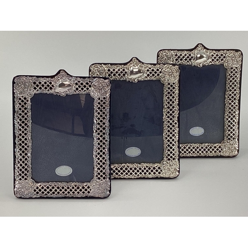 39 - Trio of Sterling silver picture frames with pierced decoration by Keyfold Frames, Ltd, London 1991, ... 