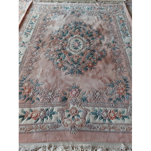 644 - Large C20th Oriental style wool rug, pink and cream ground, 312 x236cm